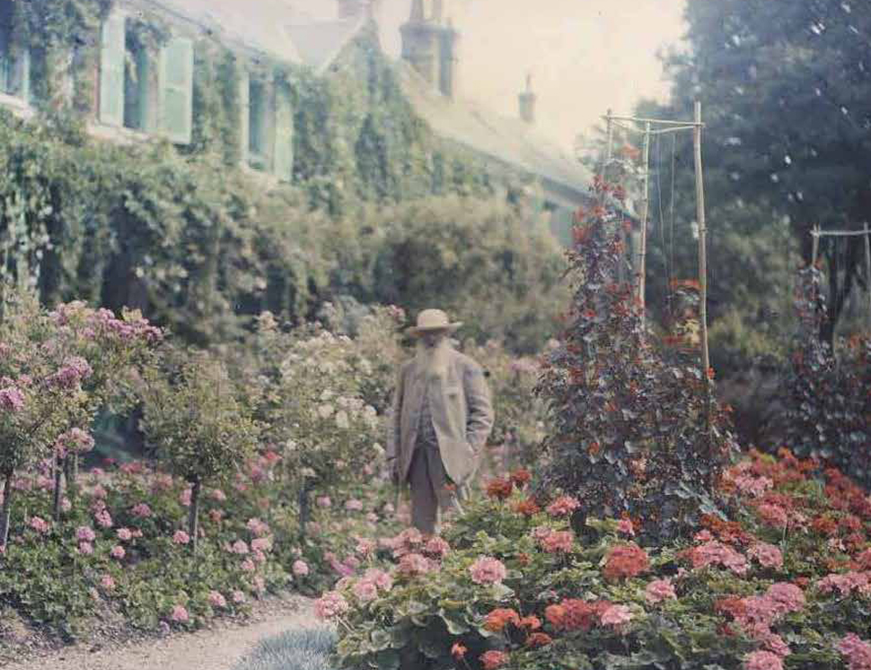 Claude Monet in front of his house in Giverny, 1921