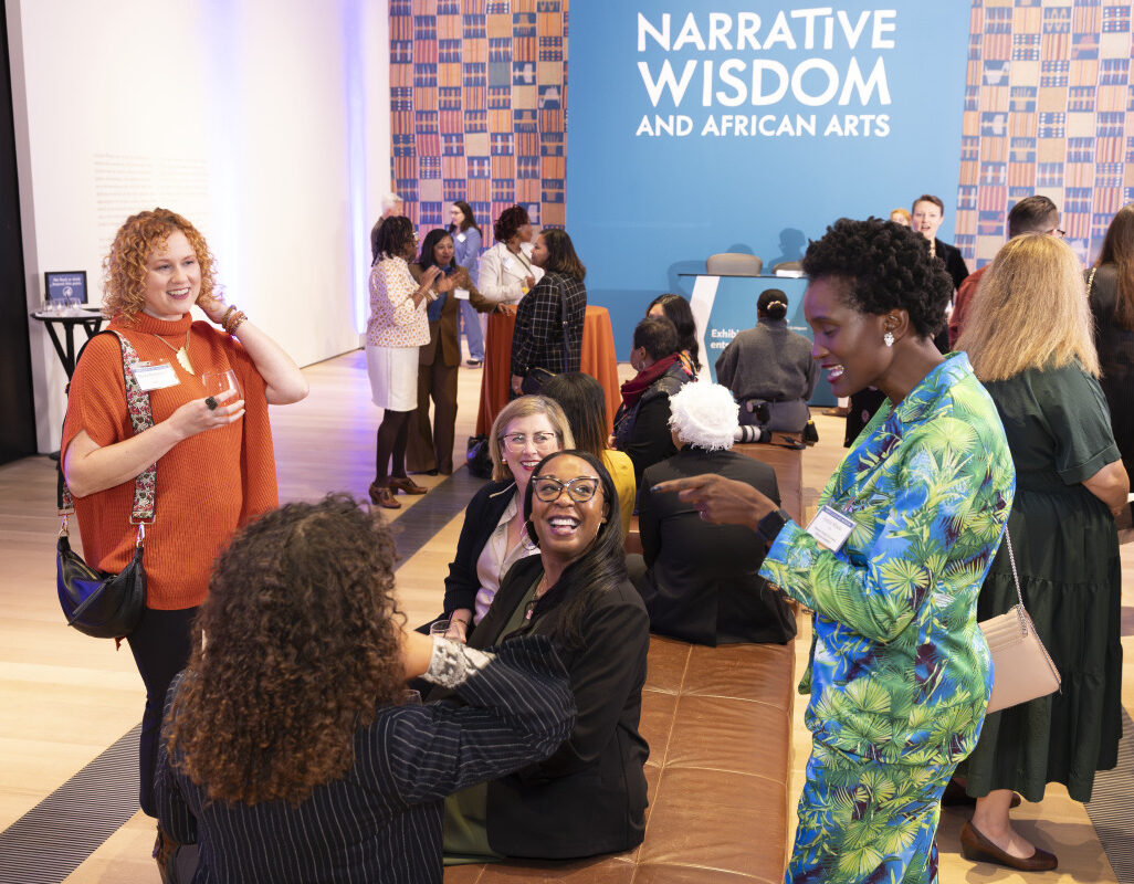 Guests smile and laugh at the 2024 reception