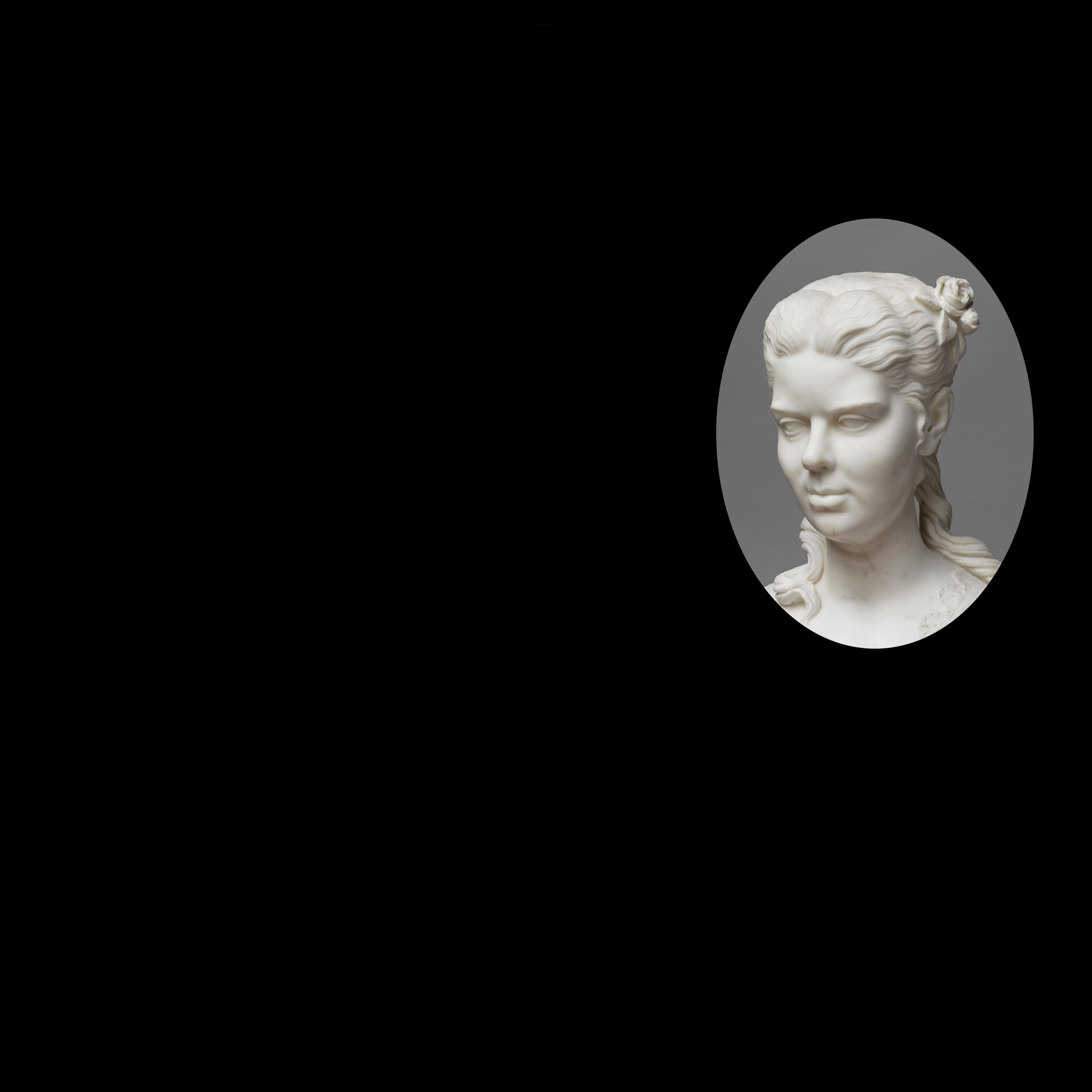 Oval crop of marble statue of a woman, showing just her head, with a black background.