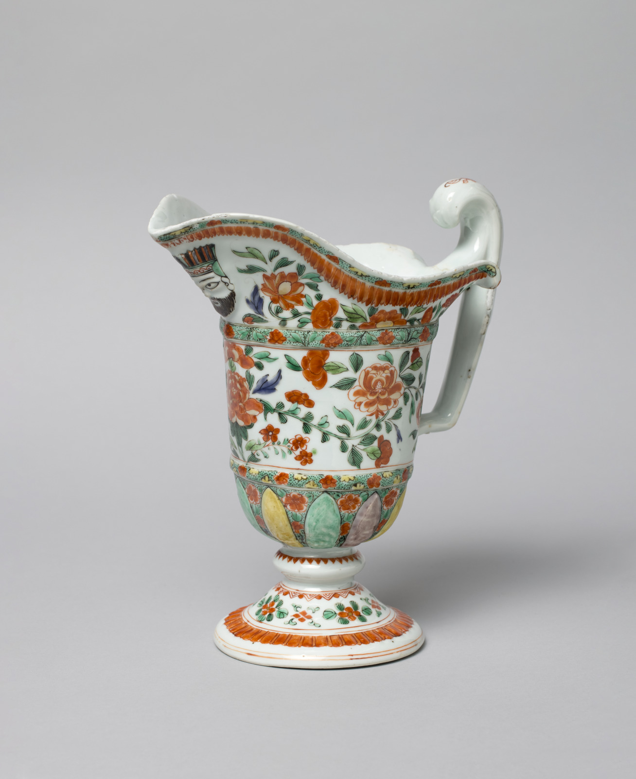 Ewer with Design of Floral Motifs and Mask of a Bearded Man