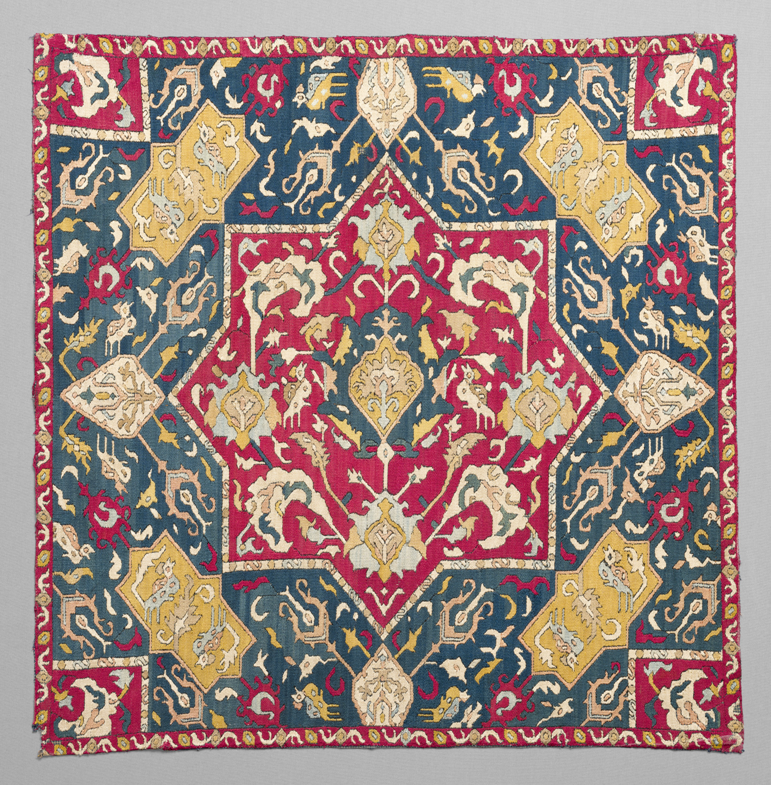 Cushion Cover with Design of Flowers and Mounted Figures in Eight-pointed Star with Birds in Cartouches