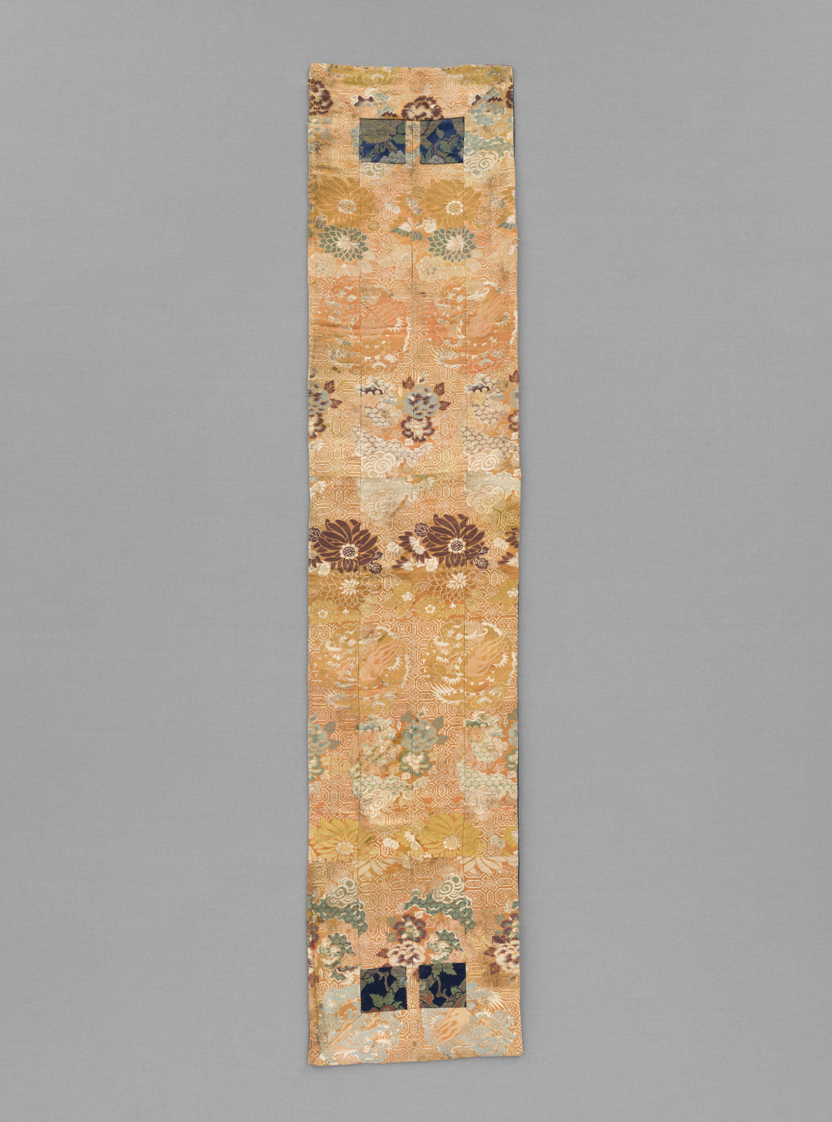 Buddhist Priest’s Stole (ōhi) with Design of Coiled Dragons, Lion-dogs, Peonies, and Chrysanthemums