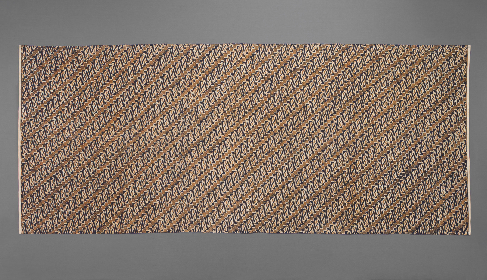 Lower Body Wrapper (kain panjang) with Design of the “Broken Dagger on Dark Background” (parang curigo latar cemeng) Motif