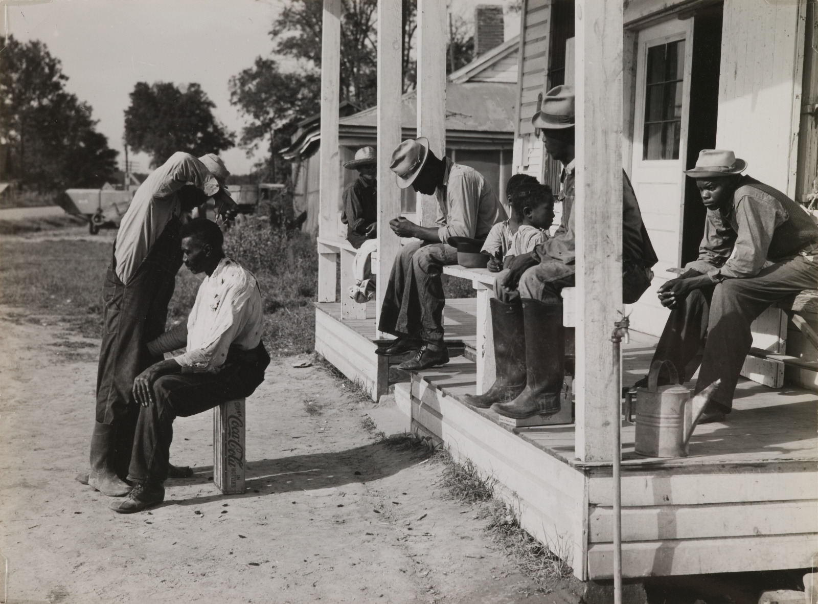 Haircutting in Front of General Store, Mileston Plantation, Mileston, Mississippi Delta