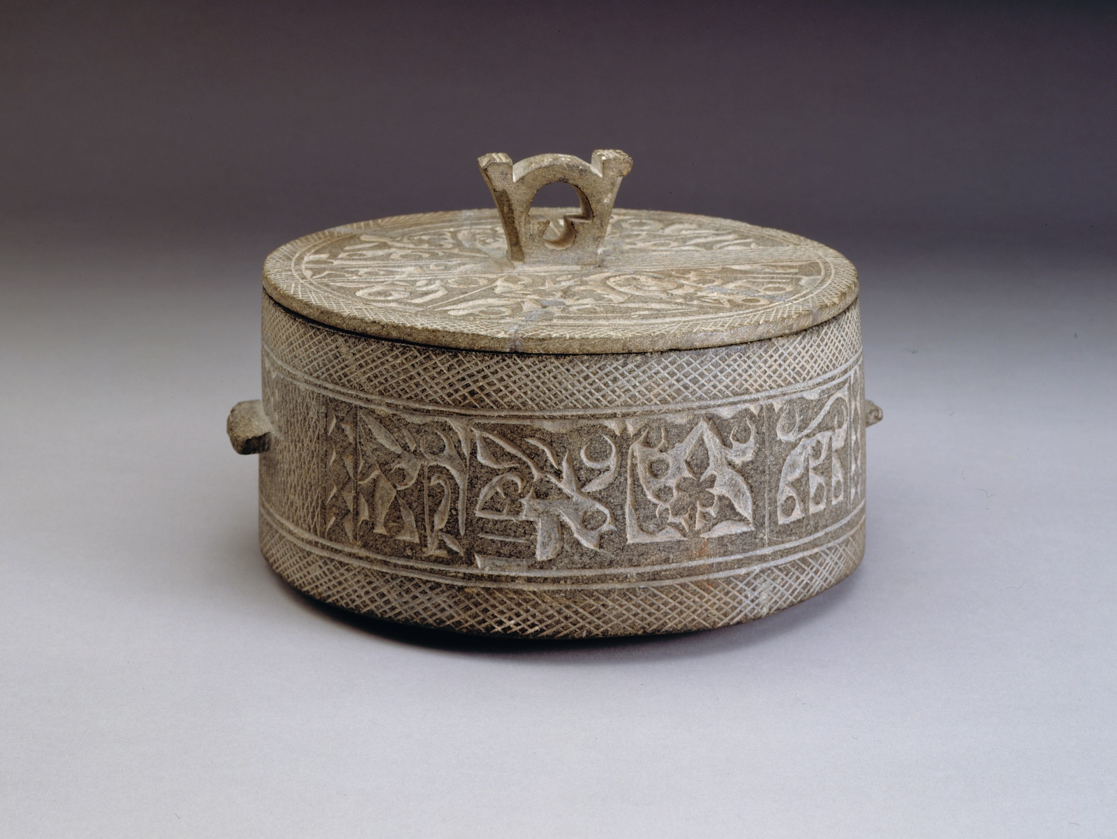 Covered Vessel with Relief Design of Arabic Inscription in Kufic Script