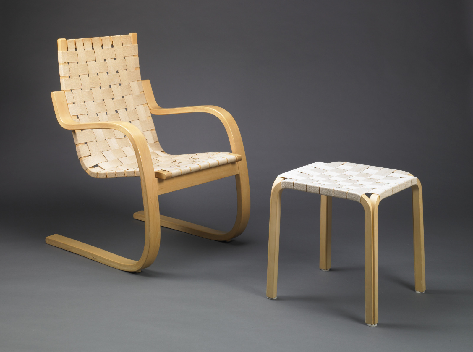 Lounge Chair with Ottoman, Alvar Aalto, Finnish, 1898–1976, chair designed c.1938, ottoman designed c.1946, Beech and fabric…